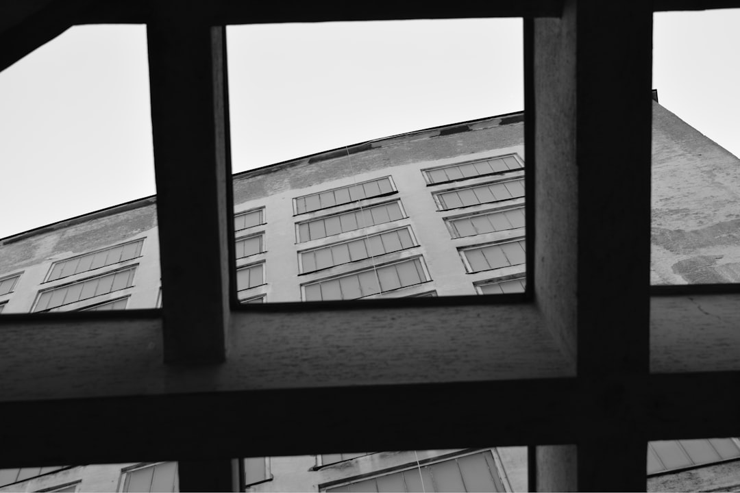 grayscale photo of concrete building