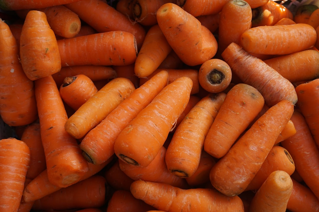 orange carrots on black surface